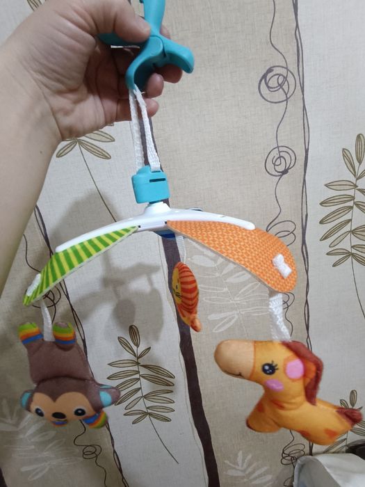 Іграшка на коляску