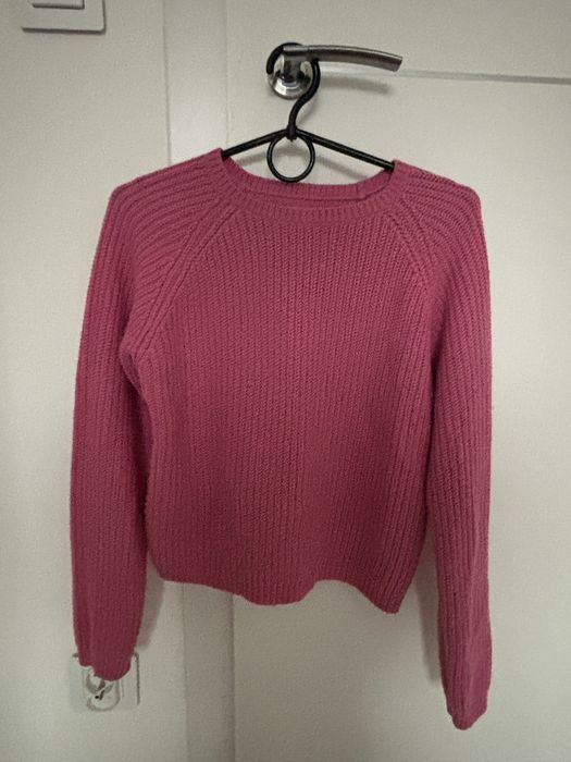 Różowy sweter