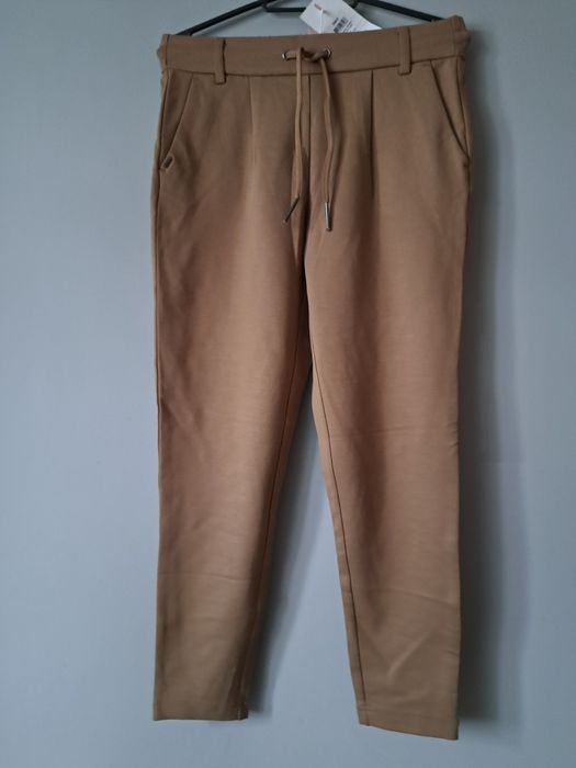 Nowe piękne karmelowe spodnie Xs/34 only