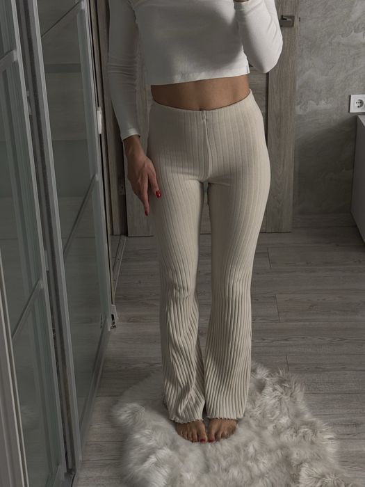 Штани в рубчик, кльош, з рюшами