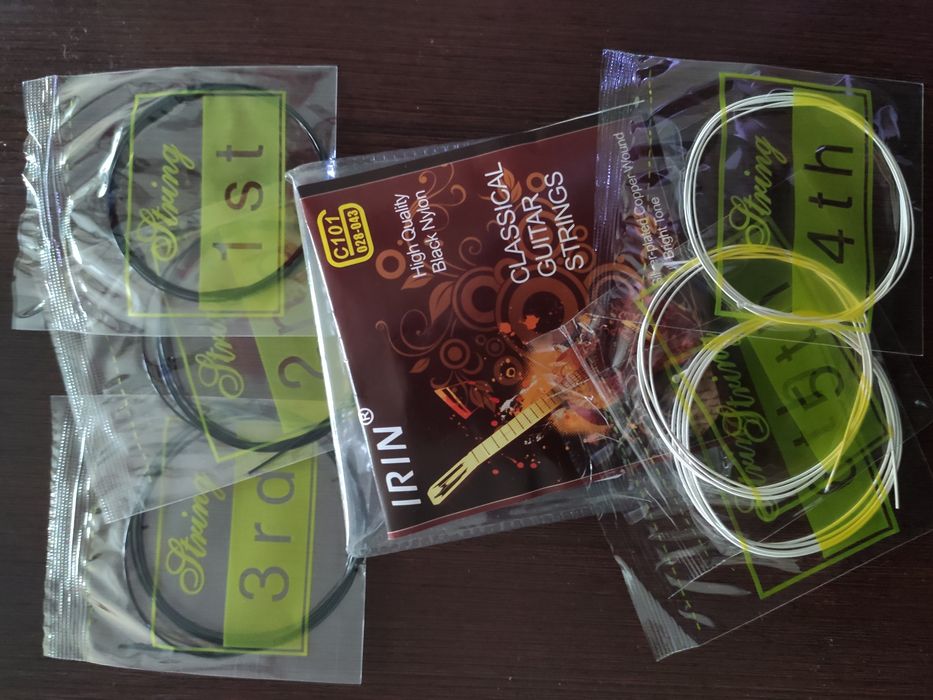 Нейлоновые черные струны HIGH  для классической гитары посеребренные