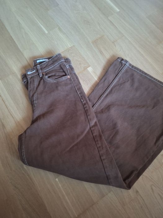 Damskie jeansy dzwony Bershka 32