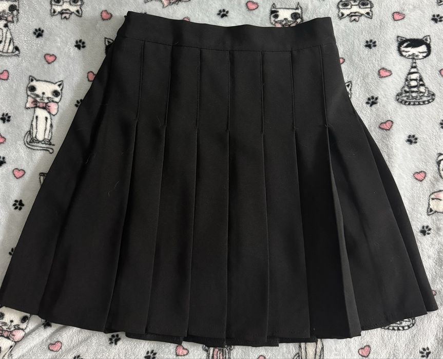 Міні-спідниці жіночі чорного кольору