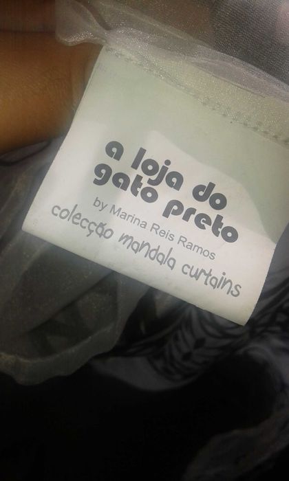 Cortina A loja do Gato Preto