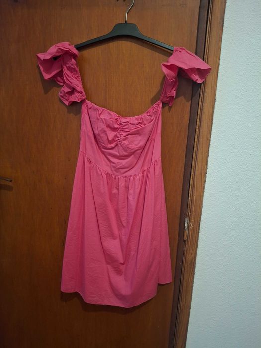 Vestido com mangas descaidas