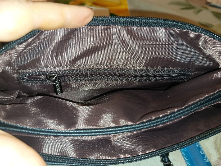 Сумка з черепами та шипами