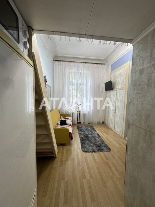 Продам двухуровневую комнату  в центре