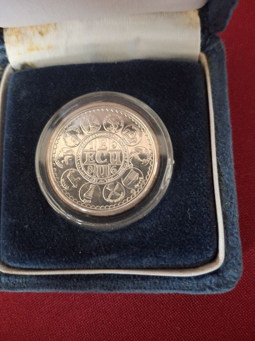 Moeda "ECU 86" em prata fina com diâmetro de 30 mm e peso de 12.5 g - Coleçoes Philae