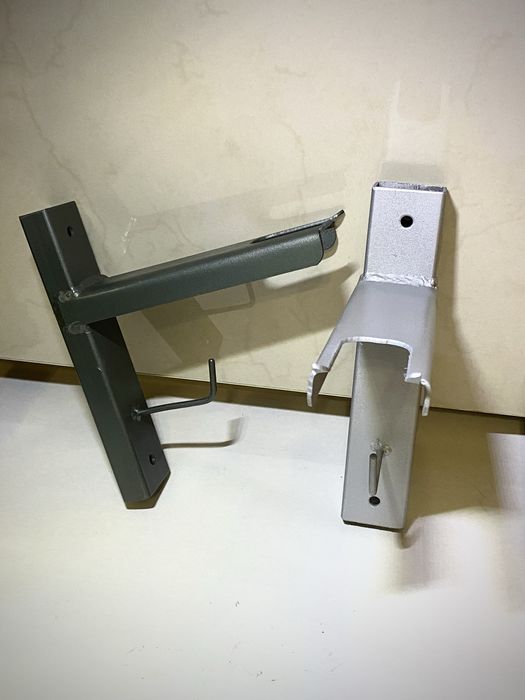 Кріплення, тримач, кронштейн для бензопили, триммера