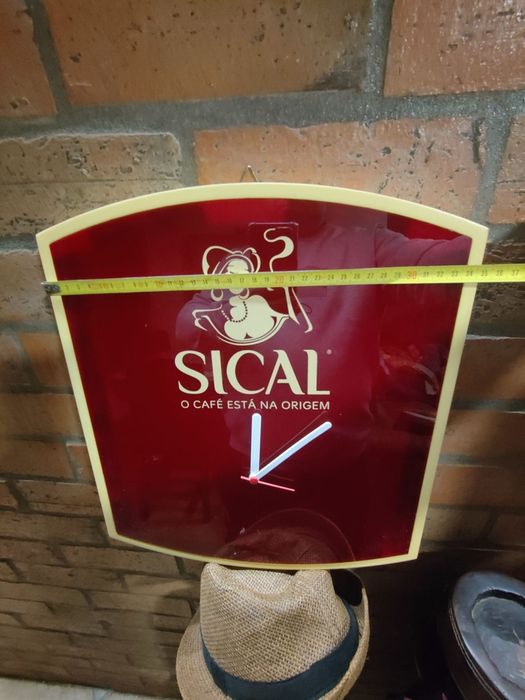 Letreiro relógio SICAL