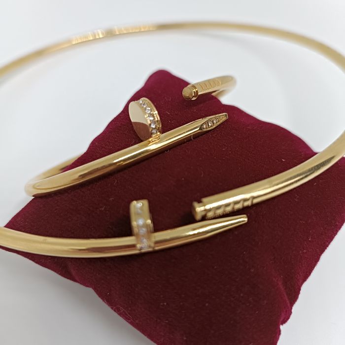 Набір прикрас жіночий: жорсткий чокер і браслет цвях  з цирконіями