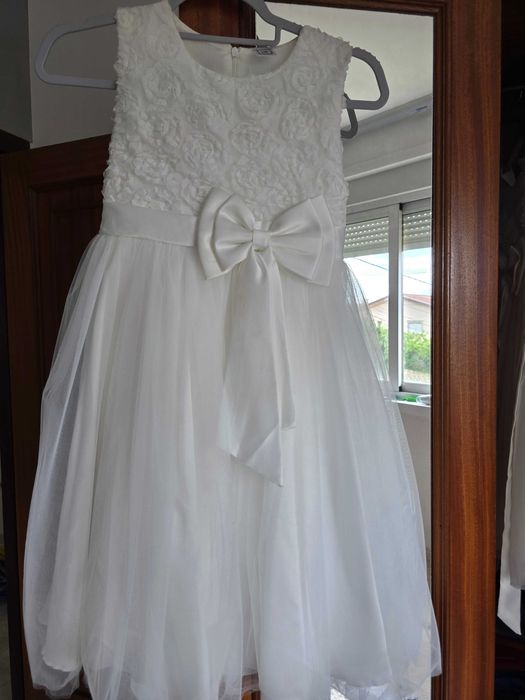 Vestdos como novo de criança de 6 anos