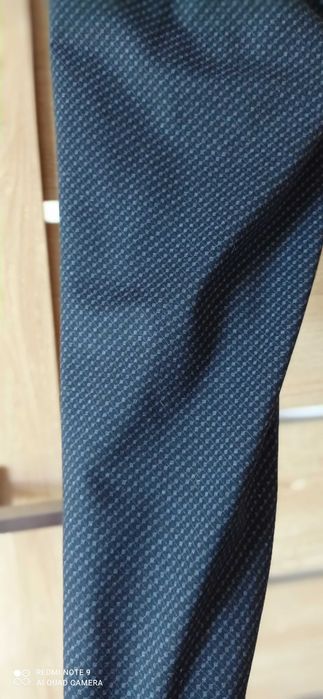 Piękne eleganckie spodnie materiałowe 48 AXENA