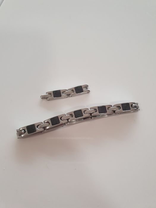Pulseira em aço e preto