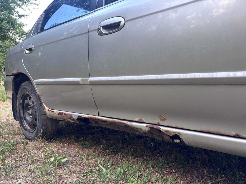 Kia Sephia 2003, Газ/Бензин