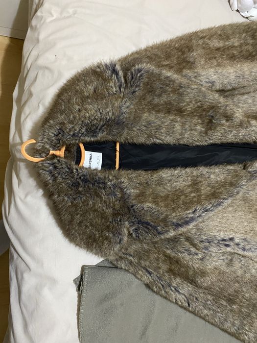 casaco de pelo longo