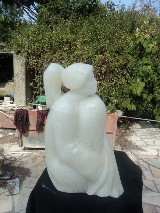 Escultura em pedra onix