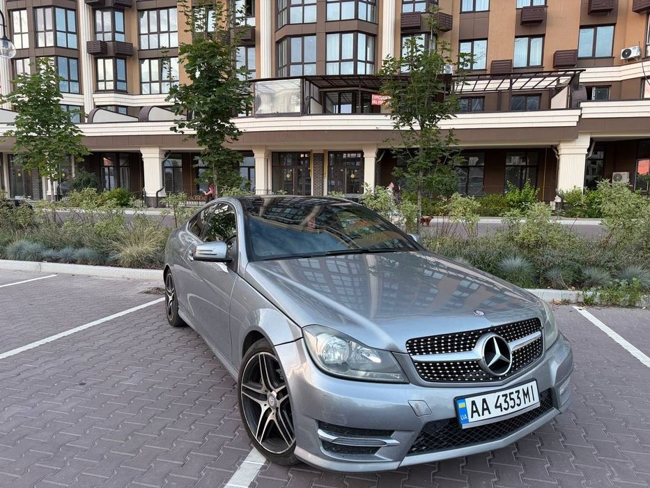 Mercedes-Benz C-Class 2014 VIN WDDGJ4HB2FG371207 фото оголошення 13 з 15