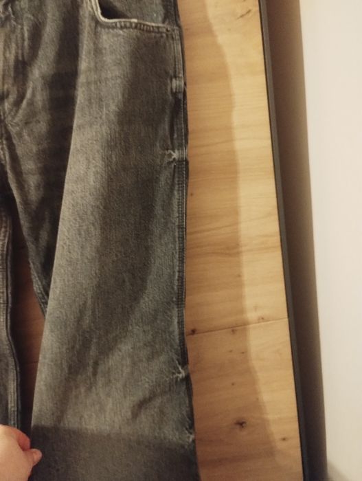 Męskie czarne spodnie jeansowe flare Zara r.44