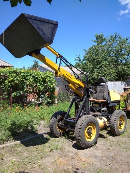 Повнокерований міні погрузчик