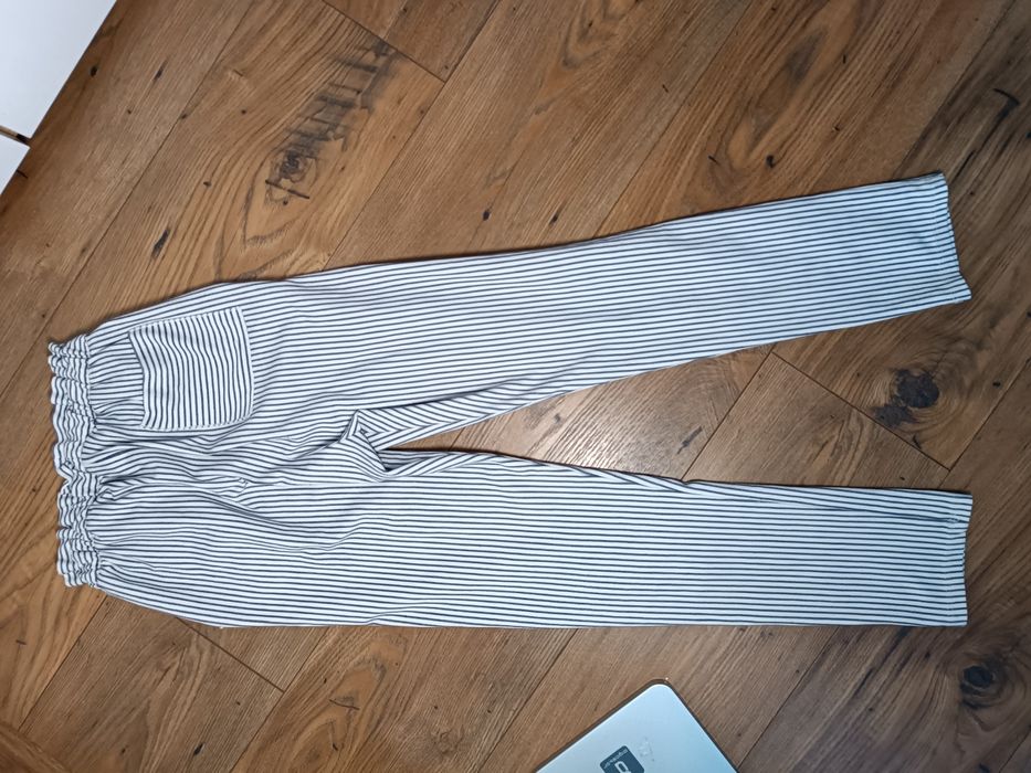 Eleganckie spodnie w paski 128 białe C&A