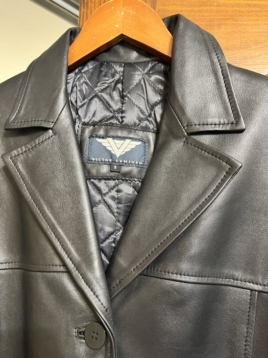 Шкіряне пальто .