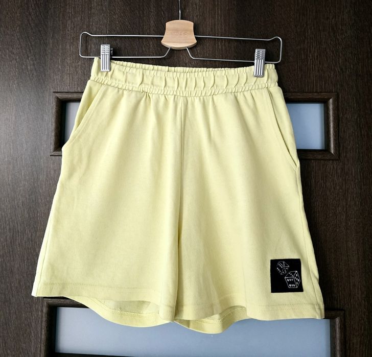 Reporter Young żółte spodenki dresowe 146