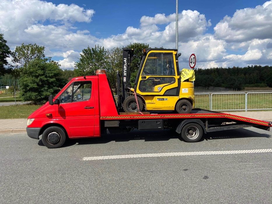 POMOC DROGOWA  laweta holownik mokotow ursynow odpalanie przewozy A2