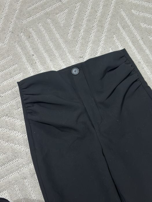 Штани кльоші Zara