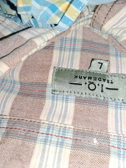 20 чоловічих фірмових сорочок, тенісок.