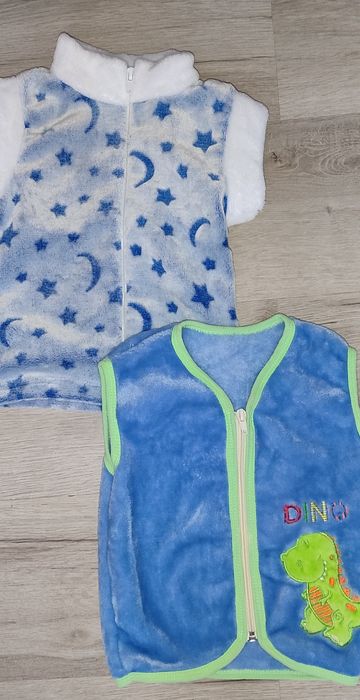 Безрукавочки теплі,нові