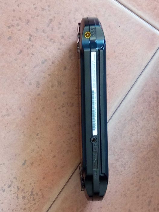 PSP Console as New with Case and Charger + 2 Games64354168652545121