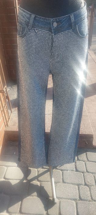 Damskie spodnie jeansowe roz xl