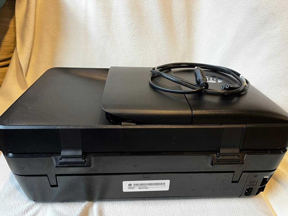 Vendo impressora HP OfficeJet 5230 a funcionar corretamente.