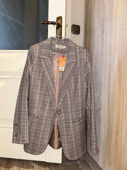 Жіночий піджак новий