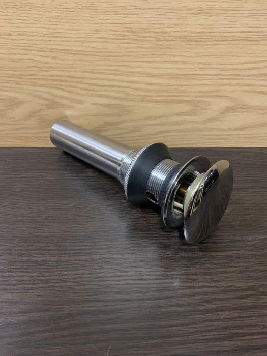 Аксессуары для ванной комнаты: донный клапан и смеситель TUNY