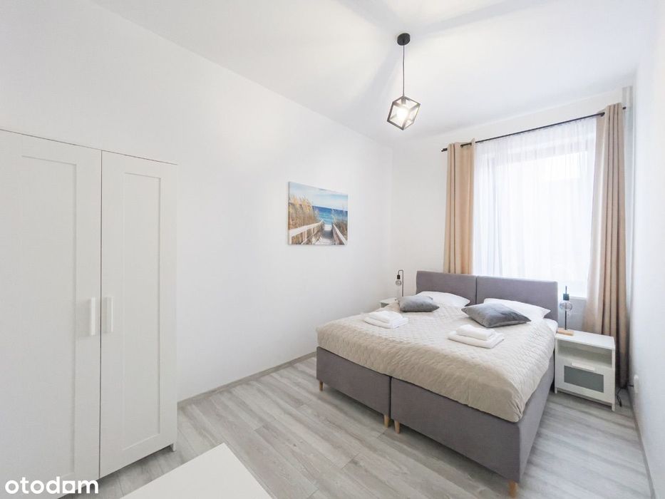 Przestronny Apartament z 2 Sypialniami i Balkonem