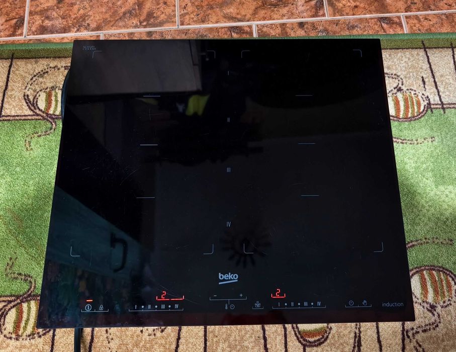 Płyta indukcyjna BEKO HII 68600 PT # Łączone pola