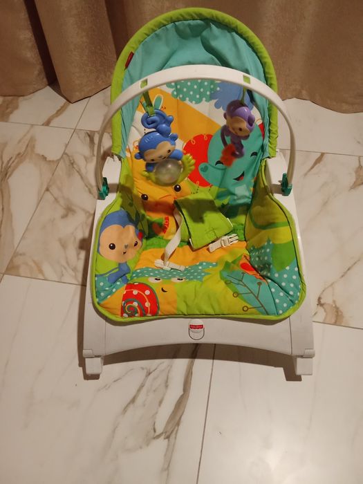Дитяче крісло качалка з вібрацією від народження