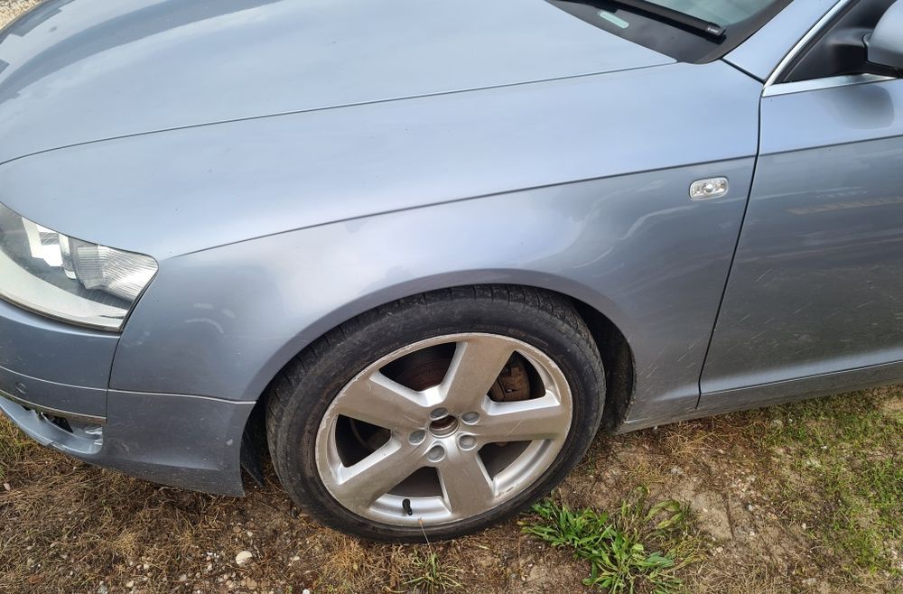 LEWY BŁOTNIK przedni Audi A6 C6 2005r LY7J