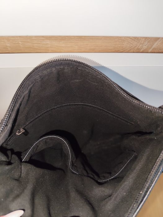 Mała listonoszka z frędzelkami