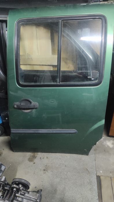 Двері капот двигун фиат Добло Fiat Doblo