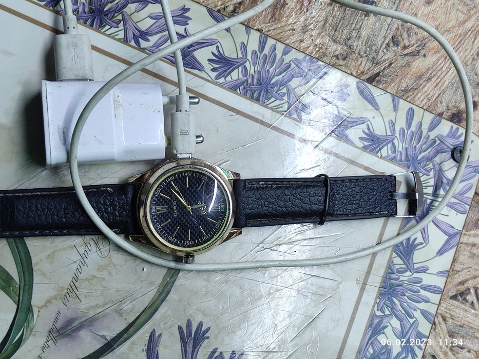 Часы с зажигалкой,зарядкой.