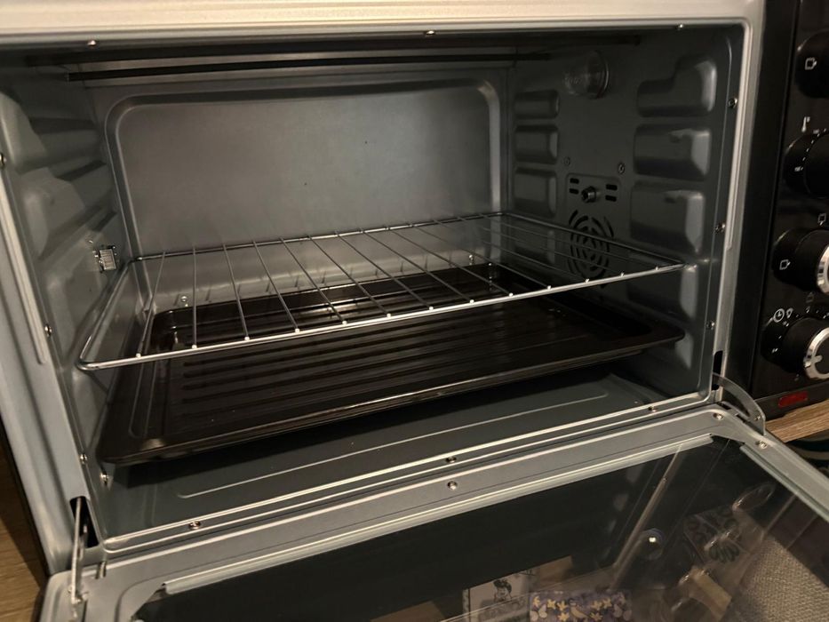 Microondas com grill e forno com espeto giratorio