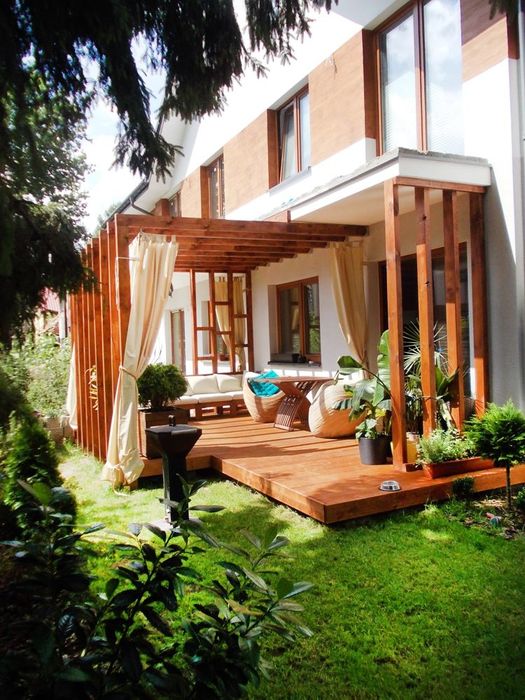 Usługi ogrodnicze - taras pergola system nawadniania trawnik rośliny