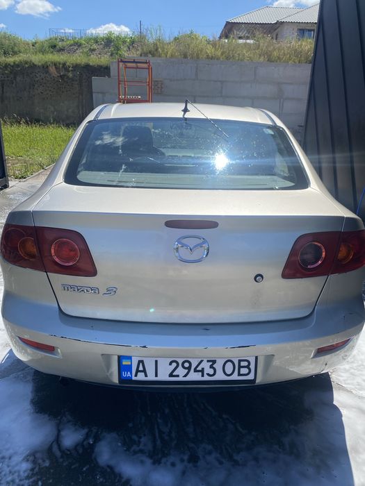 Mazda  3.   2004