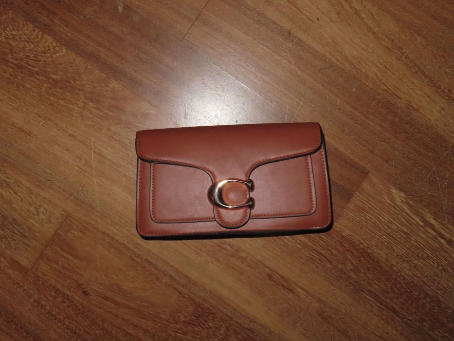 Bolsas femeninos em pele sintética