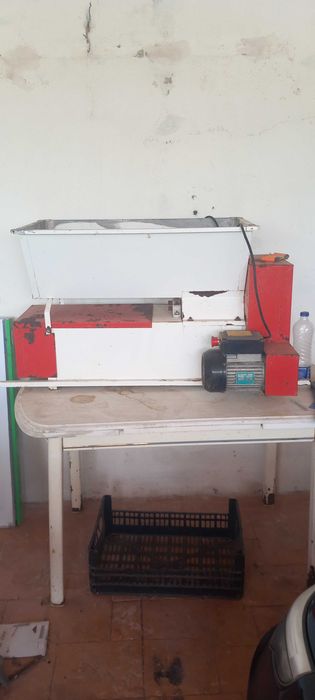 Maquina eletrica de espremer e separação ingaassos.