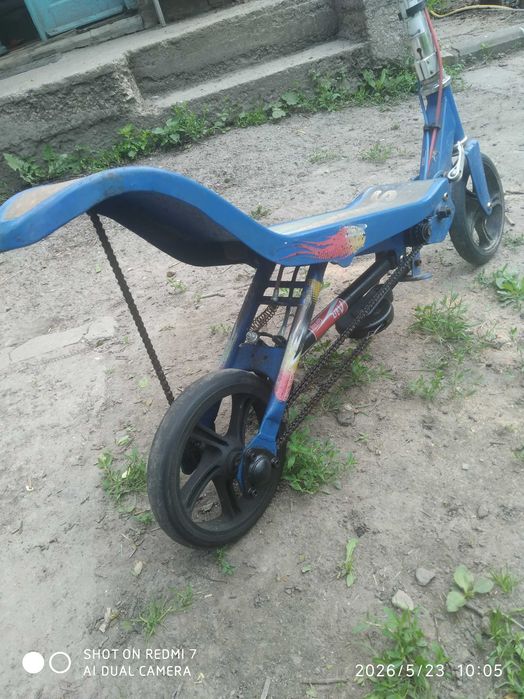 Самокат з механічним рухом