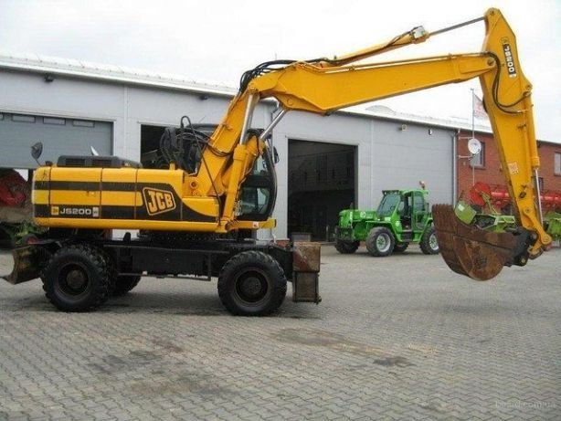 Аренда экскаватора,гидромолота,самосвала Киев и обл